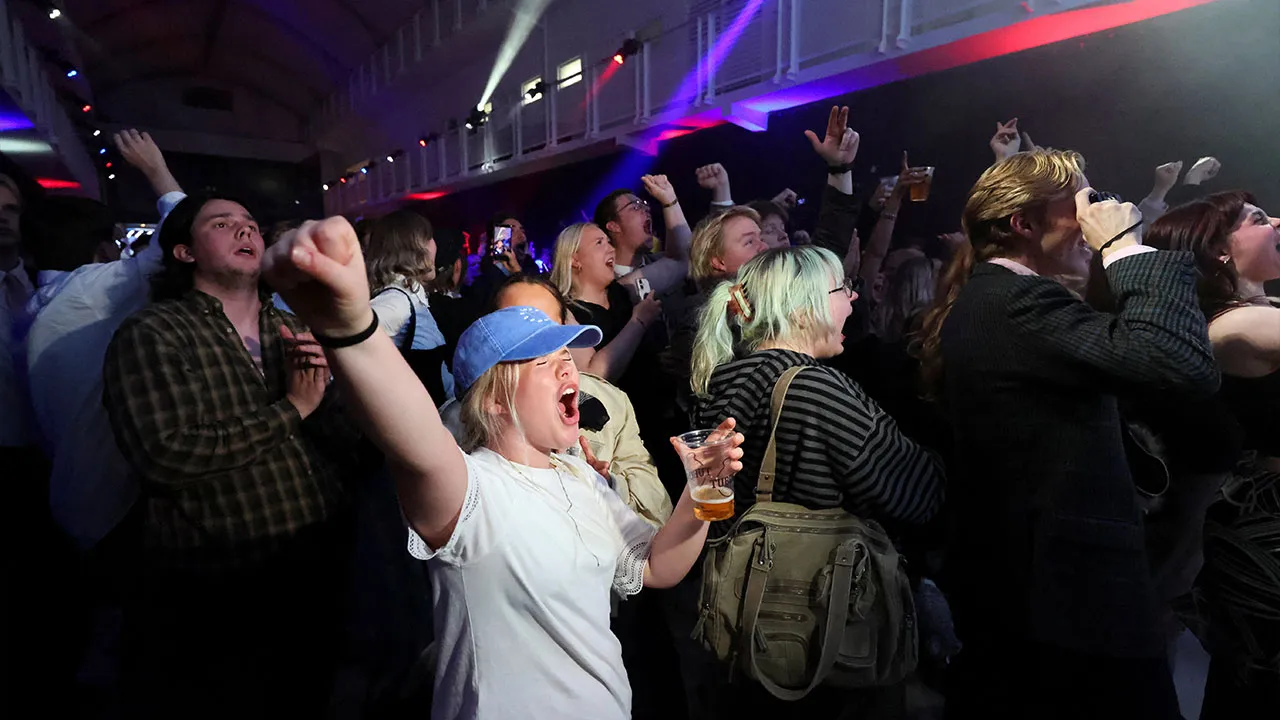 Supporters of the "Yes to See" campaign, which supports resuming EU accession negotiations, react to the early projections of a referendum on whether Iceland should resume accession negotiations with the European Union, in Reykjavik, Iceland, August 30, 2026. REUTERS/Leonhard Foeger
