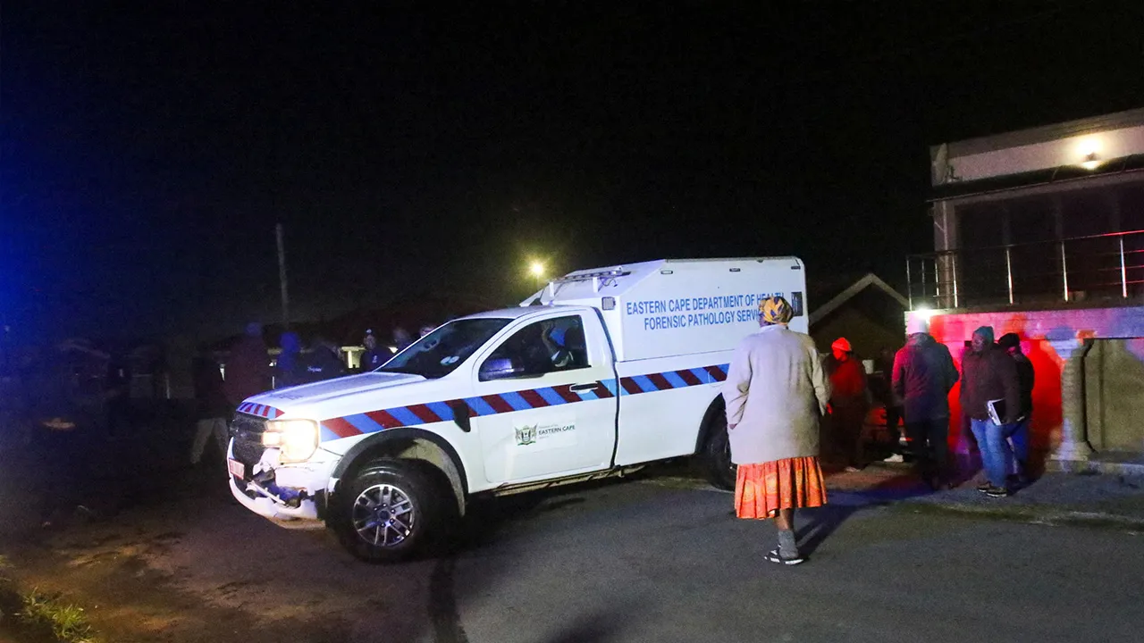 A forensic pathology vehicle is parked outside the home of former two-weight world boxing champion Zolani Tete following a fatal shooting in Mdantsane, Eastern Cape, South Africa, August 21, 2026. REUTERS/Stringer