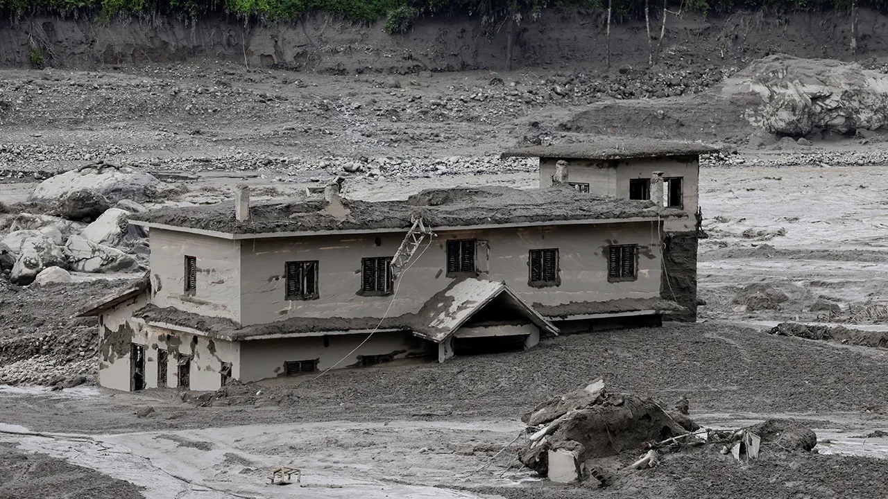A mud-covered building following a flash flood at Trishuli in Nuwakot district, Nepal, August 26, 2026. REUTERS/