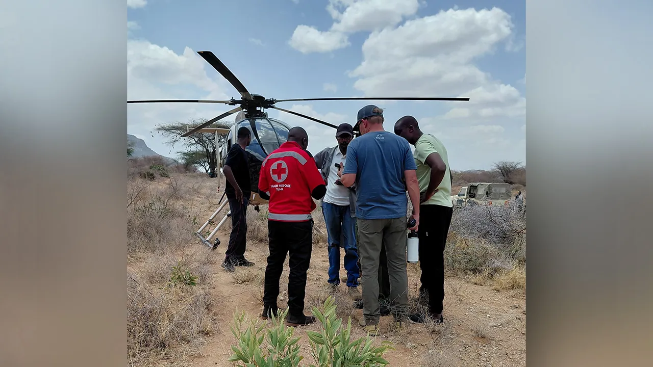 Rescue officials work at the site of a tourist helicopter crash that caused multiple casualties, according to the police, in Samburu County, Kenya, August 19, 2026. Kenya Red Cross/Handout via REUTERS THIS IMAGE HAS BEEN SUPPLIED BY A THIRD PARTY. NO RESALES. NO ARCHIVES. MANDATORY CREDIT.