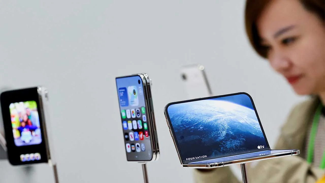 The new foldable iPhone Duo is on display during Apple's event at the Steve Jobs Theater in Cupertino, California, U.S. September 9, 2026. REUTERS/Carlos Barria