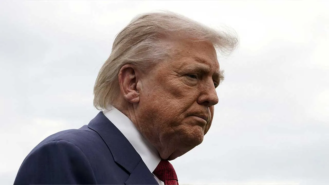 FILE PHOTO: U.S. President Donald Trump looks on at the White House in Washington, D.C., U.S., May 8, 2026. REUTERS/Elizabeth Frantz/File Photo