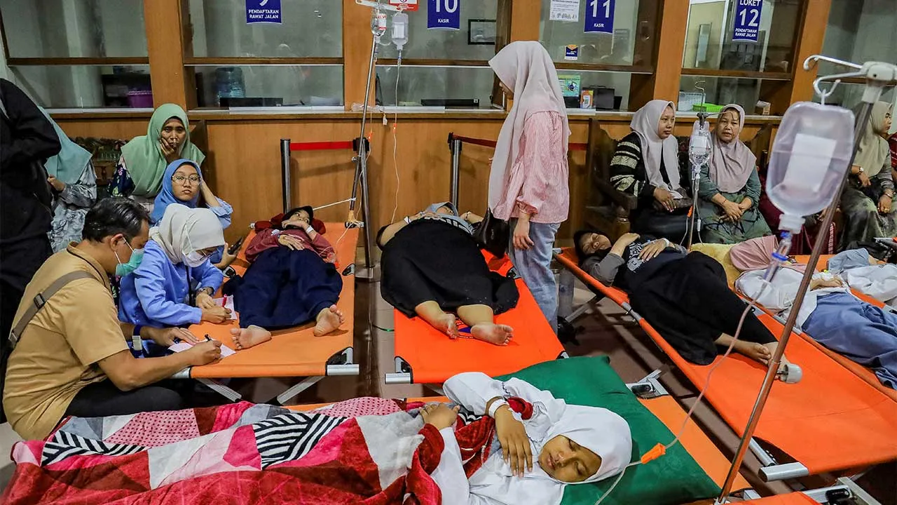 Students rest while receiving treatment for food poisoning at the regional general hospital after eating government-sponsored free school meals in Sidoarjo, East Java province, Indonesia, September 2, 2026. REUTERS/Suryanto