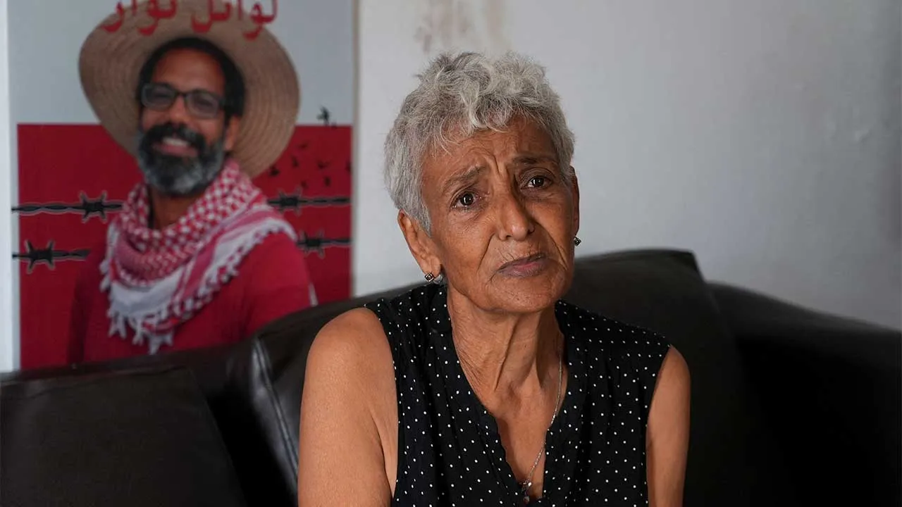 Hamida Dridi, the mother of detained pro-Palestinian activist Wael Naouar, sits in her house during an interview with Reuters in Tunis, Tunisia, September 22, 2026. REUTERS/Stringer