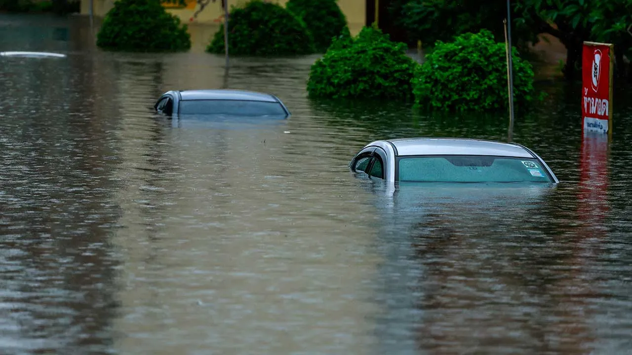 Submerged cars on a flooded street during heavy rain in Bangkok, Thailand, September 26, 2026. REUTERS/Patipat Janthong