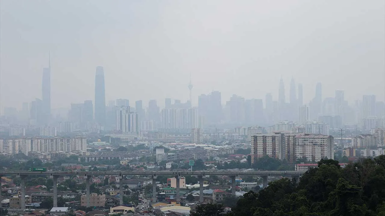 Kuala Lumpur's skyline is shrouded in haze from regional wildfires, as seen from Ampang, Malaysia, August 26, 2026. REUTERS/Hasnoor Hussain