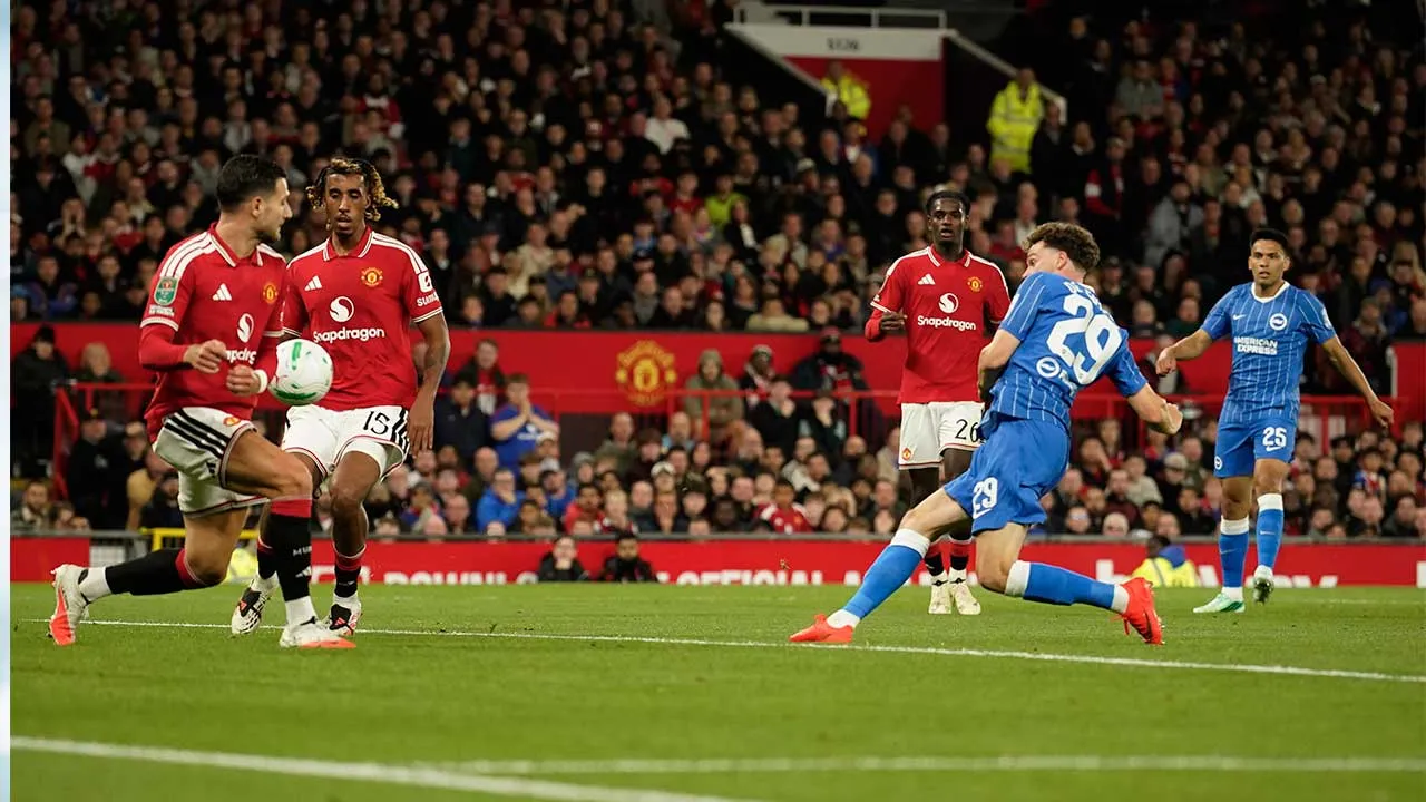 Brighton's Maxim De Cuyper, front right, scores his side's third goal during the English League Cup third round soccer match between Manchester United and Brighton and Hove Albion in Manchester, England, Wednesday, Sept. 16, 2026. (AP Photo/Dave Thompson)