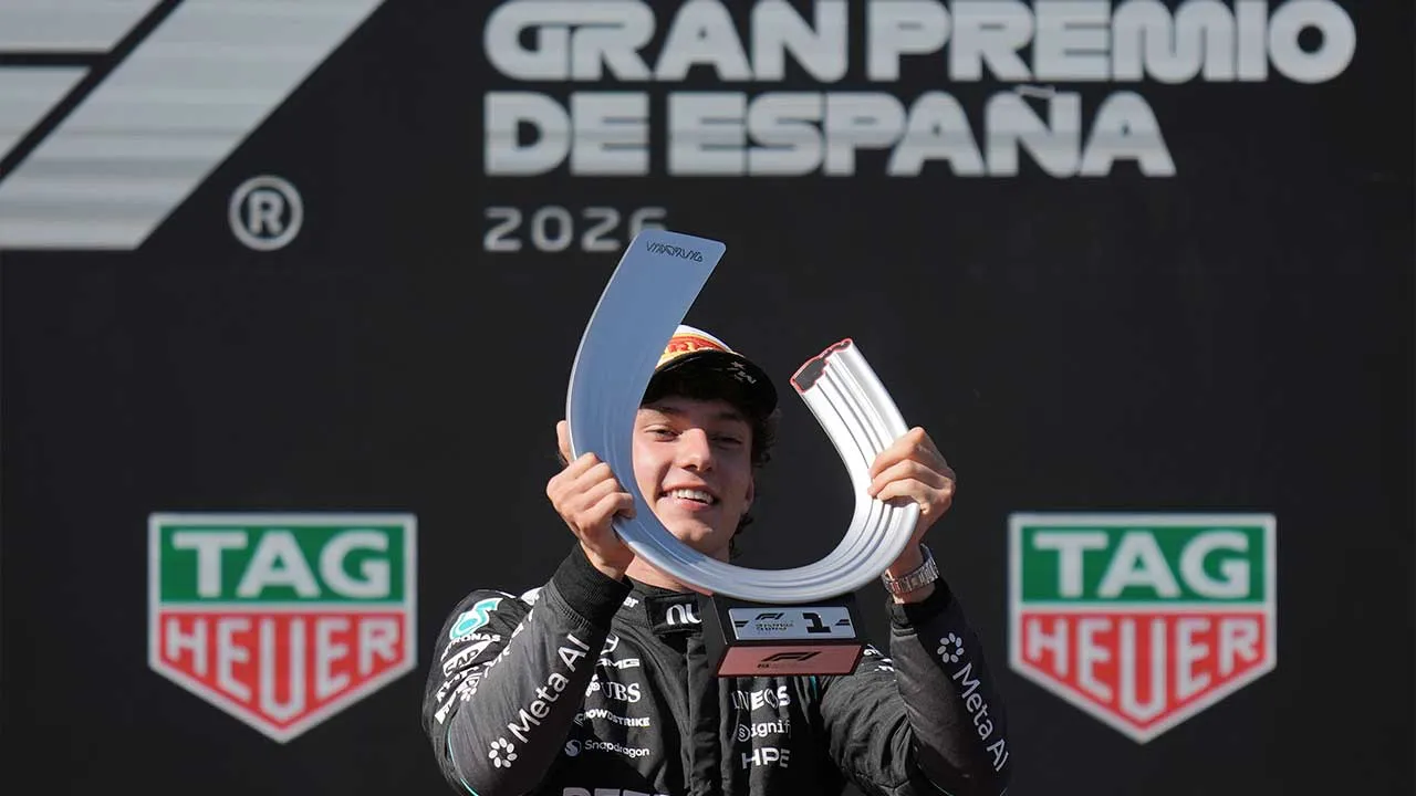 Mercedes driver Andrea Kimi Antonelli of Italy celebrates on the podium after winning the Spanish Formula One Grand Prix race in Madrid, Sunday, Sept. 13, 2026. (AP Photo/Bernat Armangue)
