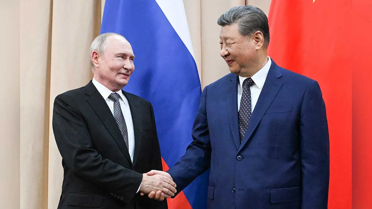 Russian President Vladimir Putin and Chinese President Xi Jinping shake hands during a meeting on the sidelines of the Shanghai Cooperation Organisation summit in Bishkek, Kyrgyzstan, August 31, 2026. Sputnik/Kristina Solovyova/Pool via REUTERS ATTENTION EDITORS - THIS IMAGE WAS PROVIDED BY A THIRD PARTY.