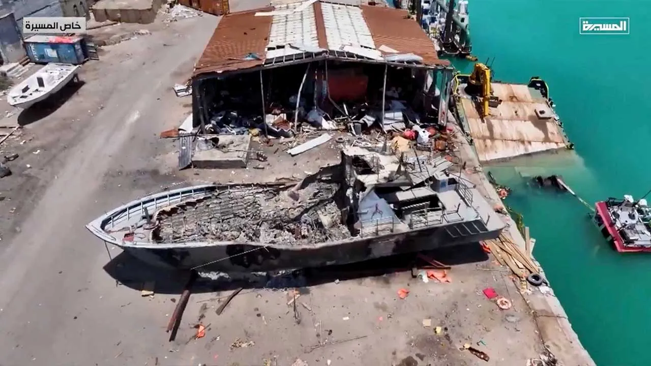 An aerial view shows a damaged boat, as Iran-aligned Houthis seized control of Yemen's port city of Mocha on Thursday, in Mocha, Yemen, in its screengrab taken from a handout video released on September 12, 2026. AL MASIRAH/Handout via REUTERS THIS IMAGE HAS BEEN SUPPLIED BY A THIRD PARTY Verification: - Location in parts of video (time codes: 00:03-00:39, 00:46-1:56, 2:01-end) verified from road layout, structures and shoreline that matched satellite imagery - Coordinates: 13.310408997486531, 43.2380930565