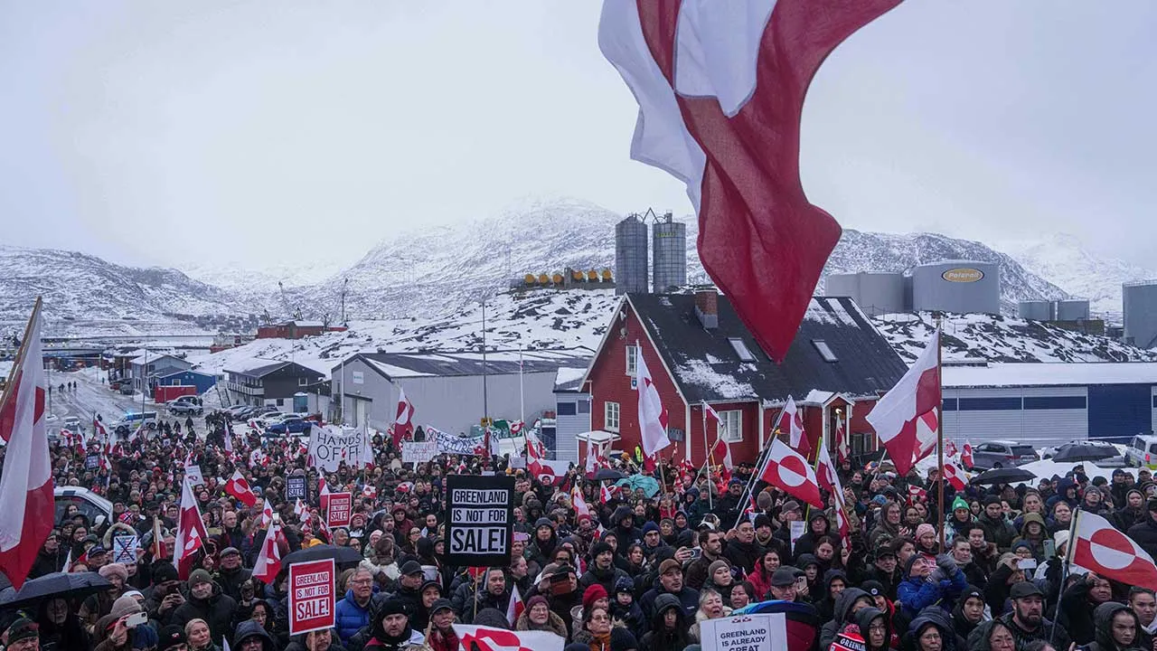 FILE - People protest against Trump's policy towards Greenland in front of the US consulate in Nuuk, Greenland, Jan. 17, 2026. (AP Photo/Evgeniy Maloletka, File)