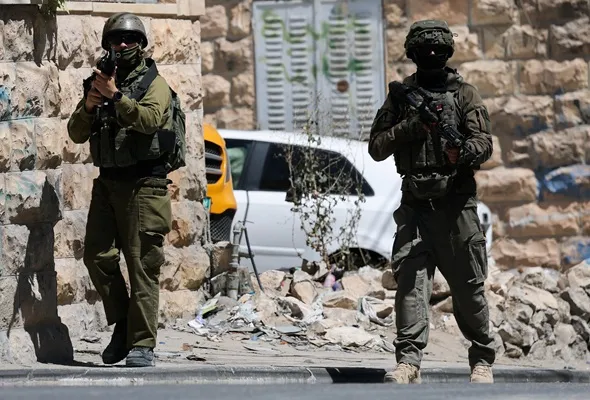 Israeli forces conduct a raid in Anata, in the Israeli-occupied West Bank, September 8, 2026. REUTERS/Ammar Awad