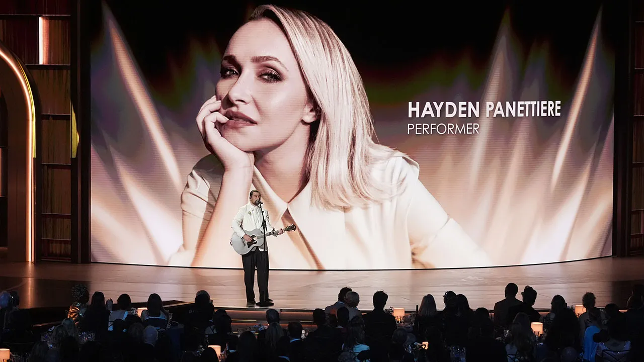 An image of Hayden Panettiere is shown while Noah Kahan performs "Bridge Over Troubled Water" during an in memoriam presentation during the 78th Emmy Awards on Monday, Sept. 14, 2026, at the Peacock Theater in Los Angeles. (AP Photo/Chris Pizzello)