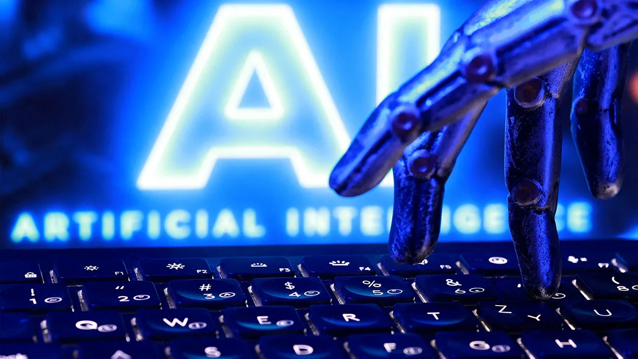 "AI Artificial Intelligence" words, a keyboard and a robotics hand in this illustration taken, September 23, 2026. REUTERS/Dado Ruvic