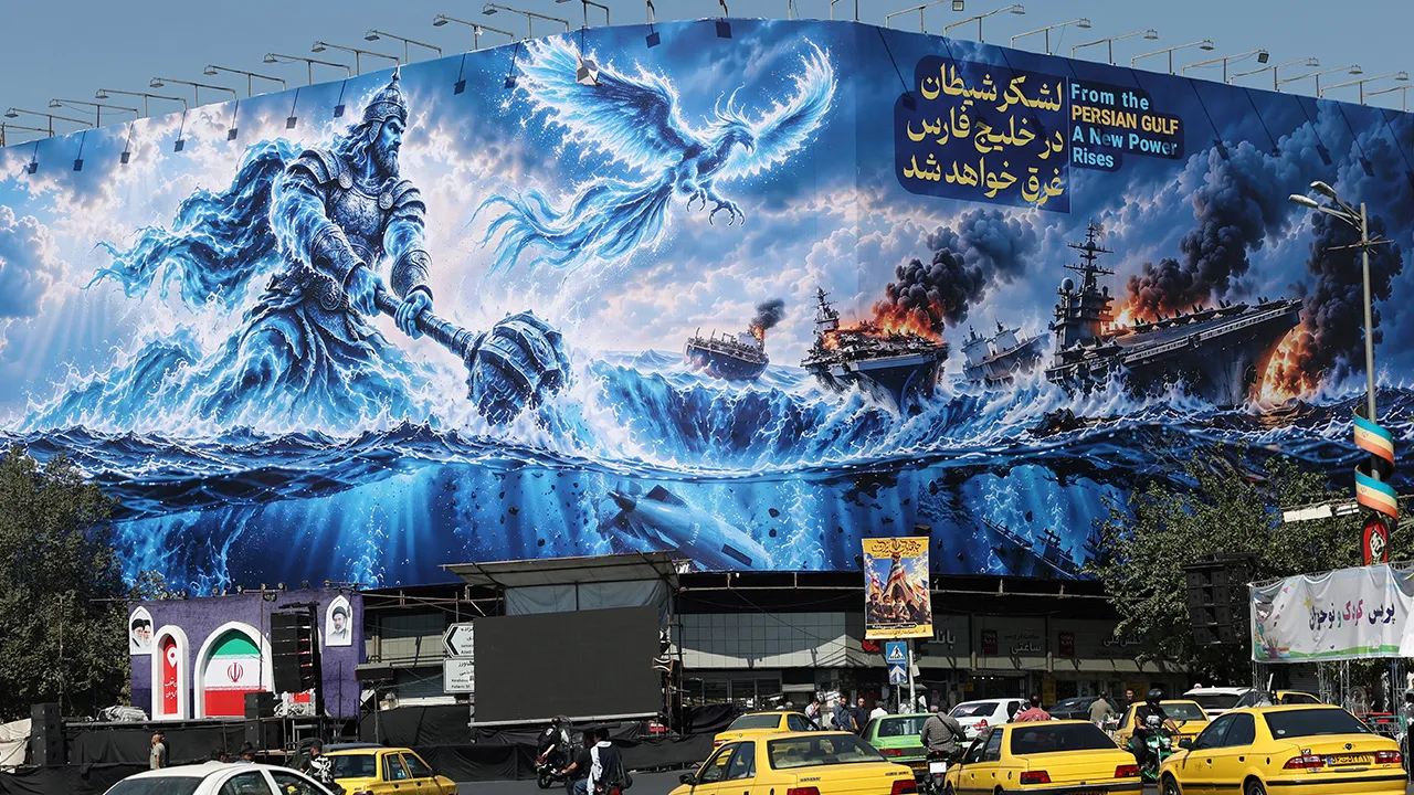 People drive past a billboard about the Strait of Hormuz, on a building in Tehran, Iran, September 16, 2026. Majid Asgaripour/WANA (West Asia News Agency) via REUTERS ATTENTION EDITORS
