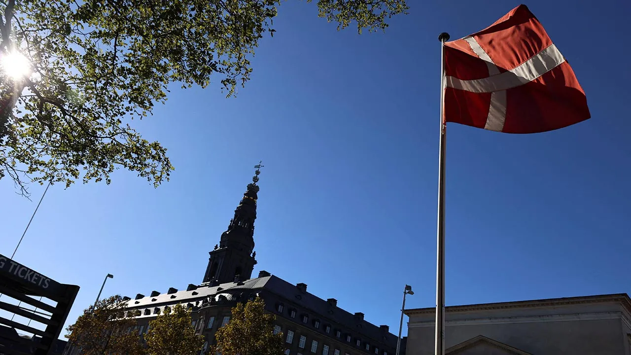 A Danish flag flutters in Copenhagen, Denmark, September 22, 2026. REUTERS/Tom Little