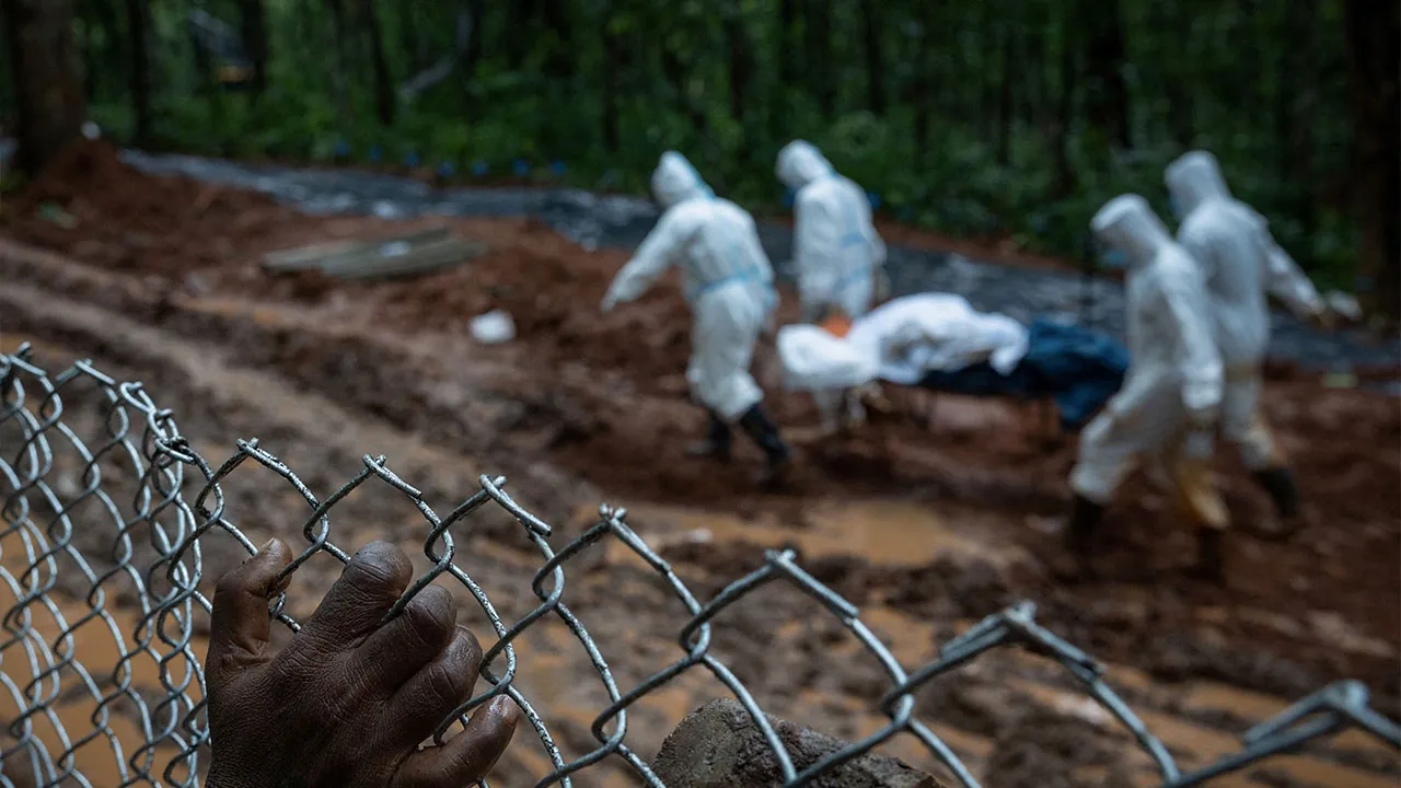 Armed Police Force (APF) officers transport a casualty to the pit at Devghat mass burial site for victims of deadly flash floods and mudslides in Chitwan, Nepal, September 1, 2026. REUTERS/Adnan Abidi