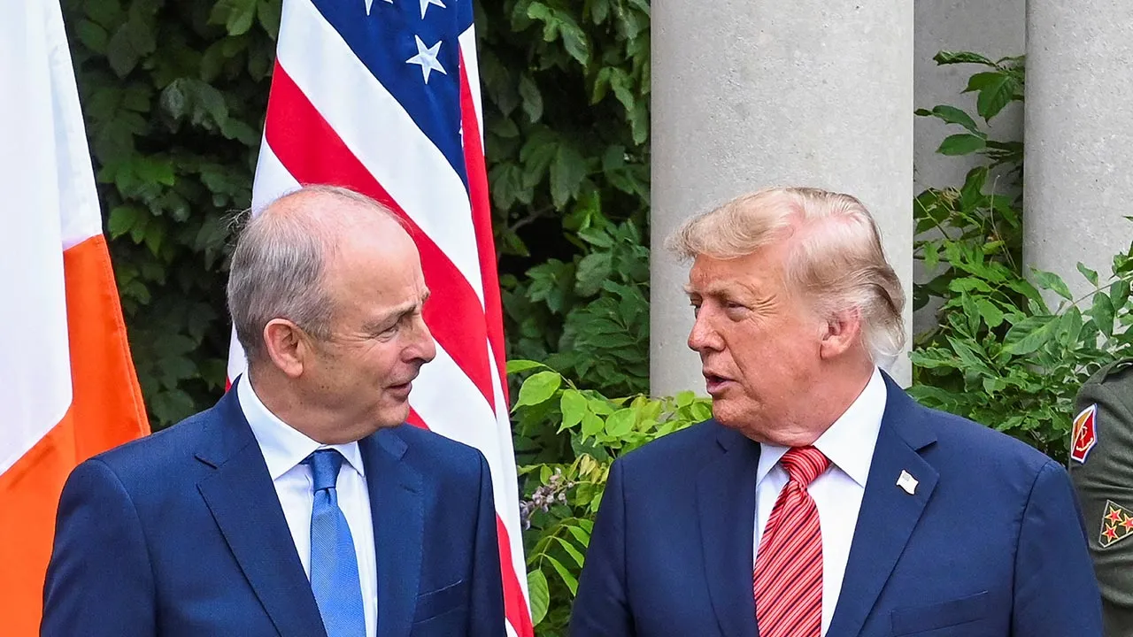 U.S. President Donald Trump is welcomed by Ireland's Prime Minister (Taoiseach) Micheal Martin at Farmleigh House in Phoenix Park, Dublin, Ireland, September 12, 2026. REUTERS/Natalia Campos