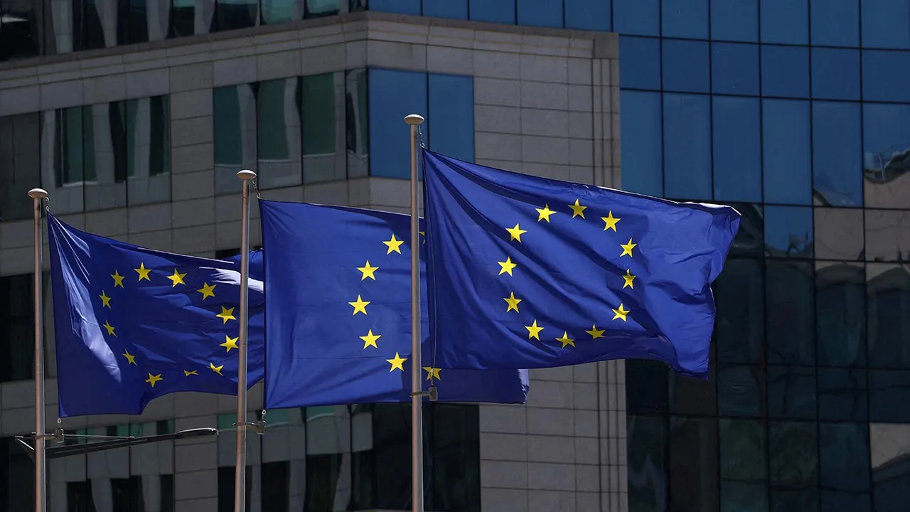 FILE PHOTO: European Union flags flutter outside the European Commission headquarters in Brussels, Belgium April 29, 2026. REUTERS/Yves Herman/File Photo