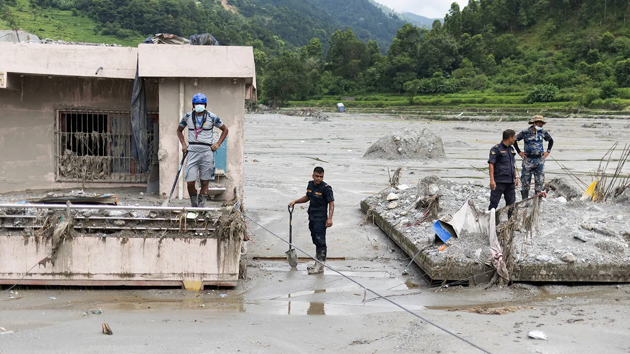 Nepal Police and Armed Police Force (APF) members search for survivors and victims of the deadly flash floods and mudslides, in Betrawati, Nuwakot district, Nepal, September 6, 2026. REUTERS/Adnan Abidi