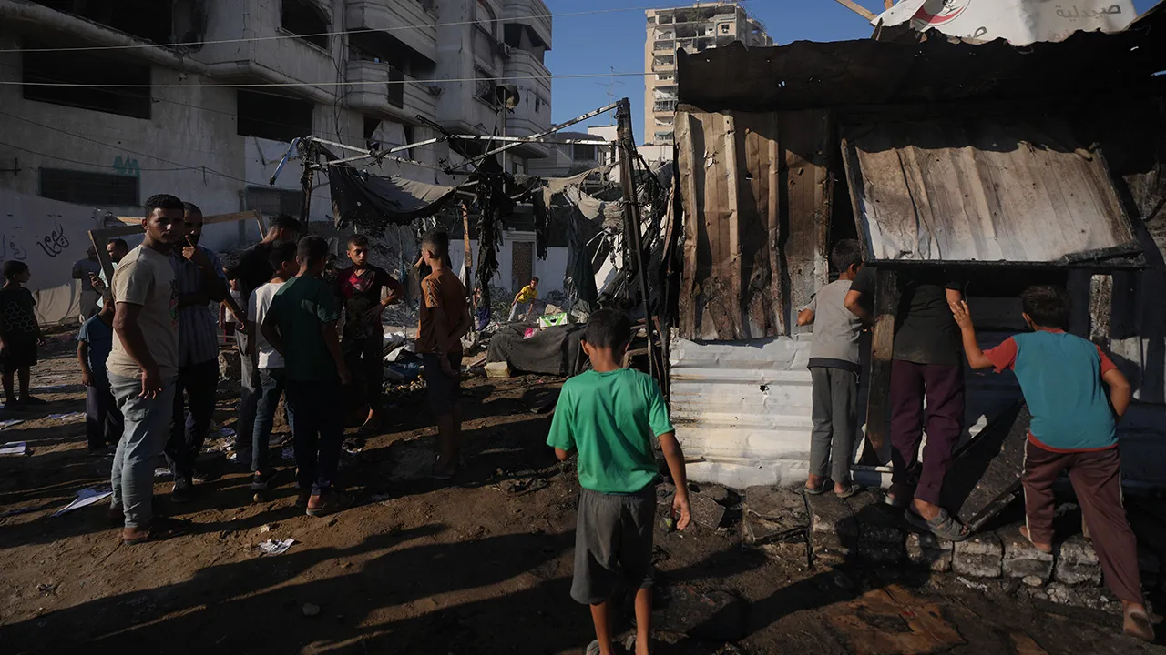 Palestinians gather at the site of an Israeli military strike that, according to health authorities, killed at least one person in Gaza City, Thursday, Aug. 27, 2026. (AP Photo/Jehad Alshrafi)