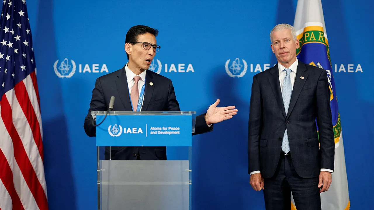 Ho K. Nie, Chairman of the U.S. Nuclear Regulatory Commission (NRC) speaks next to U.S. Energy Secretary Chris Wright during a press conference on the sidelines of the International Atomic Energy Agency (IAEA) General Conference in Vienna, Austria, September 14, 2026. REUTERS/Lisa Leutner