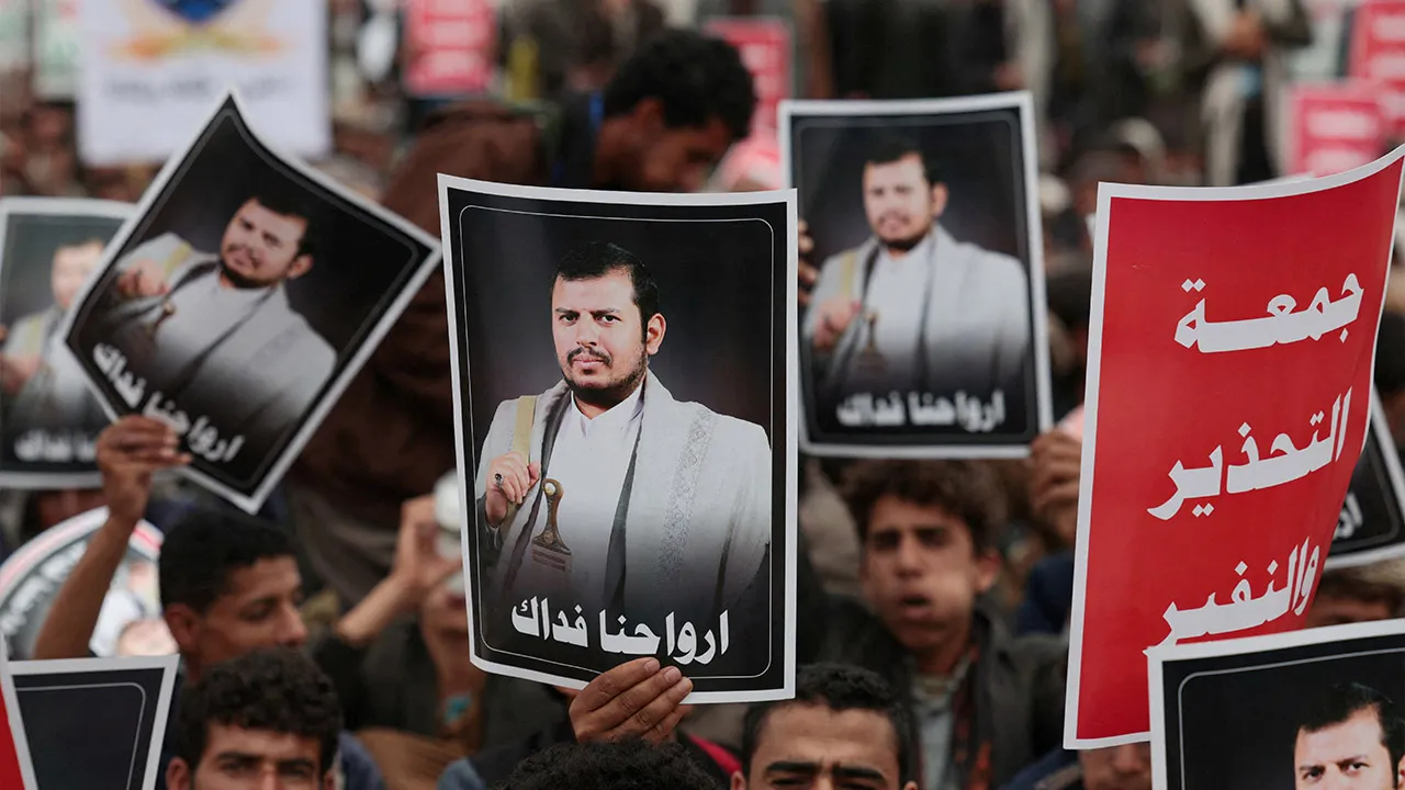 Houthi supporters hold up images of the group's leader Abdul-Malik al-Houthi, during a rally against the Saudi-led coalition's restrictions on Houthi-controlled areas, which the group describes as a blockade, in Sanaa, Yemen, July 17, 2026. REUTERS/Khaled Abdullah