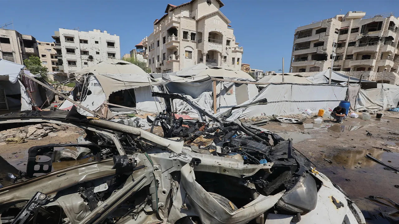 A destroyed vehicle is seen on a street following an Israeli military strike in Gaza City, Tuesday, Sept. 1, 2026. (AP Photo/Yousef Al Zanoun)
