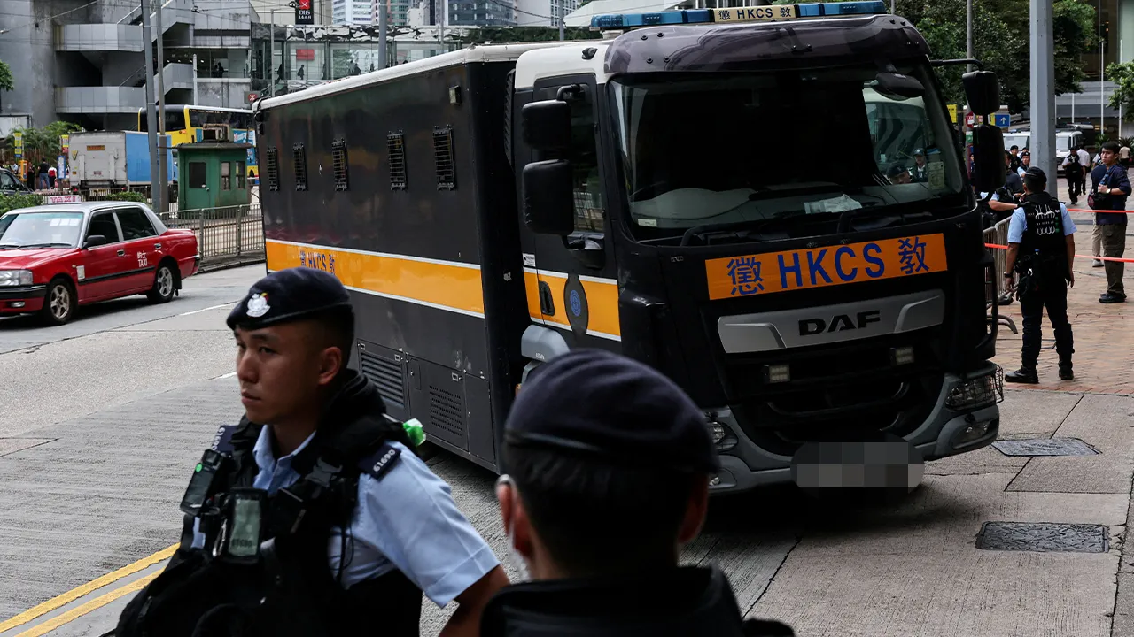 FILE PHOTO: A prison van, believed to be carrying jailed pro-democracy activist Joshua Wong, arrives at the High Court for a national security plea and sentencing hearing, in Hong Kong, China, September 2, 2026. REUTERS/Tyrone Siu TPX IMAGES OF THE DAY/File Photo