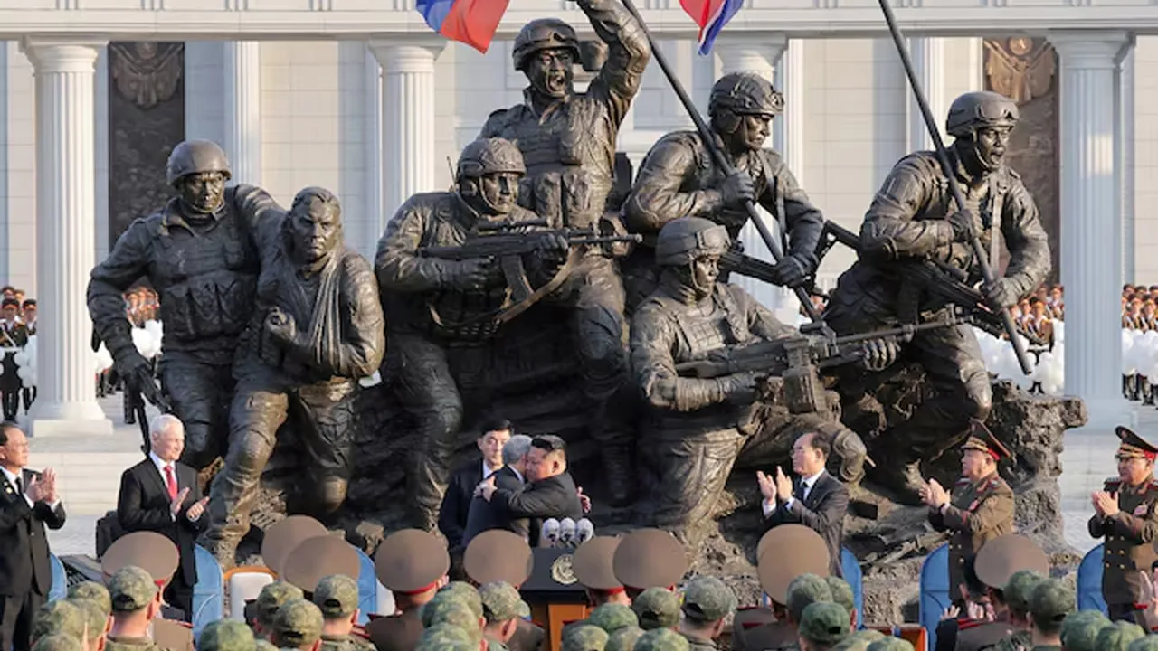 North Korean leader Kim Jong Un greets Russia's State Duma Chairman Vyacheslav Volodin asRussia's Defence Minister Andrey Belousov looks on during the opening ceremony of the Memorial Museum of Combat Feats at the Overseas Military Operations honouring North Korean troops killed while fighting for Russia in the war against Ukraine, in Pyongyang, North Korea, April 26, 2026, in this picture released by North Korea's official Korean Central News Agency. KCNA via REUTERS 