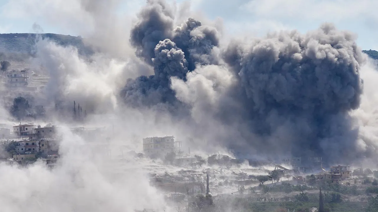 Smoke billow from an Israeli-controlled detonation in the village of Mansouri, as is seen from Hanniyeh village, southern Lebanon, Friday, Sept. 11, 2026. (AP Photo/Hussein Malla)