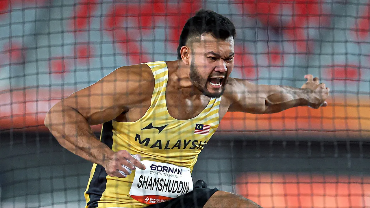 NAGOYA ,24 Sept - Atlet lempar cakera negara Muhammad Irfan Shamsuddin ketika beraksi dalam acara akhir Lempar Cakera Lelaki pada Sukan Asia Aichi-Nagoya 2026 di Nagoya City Mizuho Park Athletic Stadium hari ini. - fotoBERNAMA