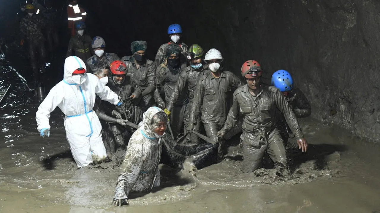 Members of a search and rescue teams carry the body of a victim from the inside the Chilime Hydropower Project tunnel, following deadly flash floods and mudslides hit parts of Nepal, in this handout obtained by Reuters on September 16, 2026. Nepal Army/Handout via REUTERS 