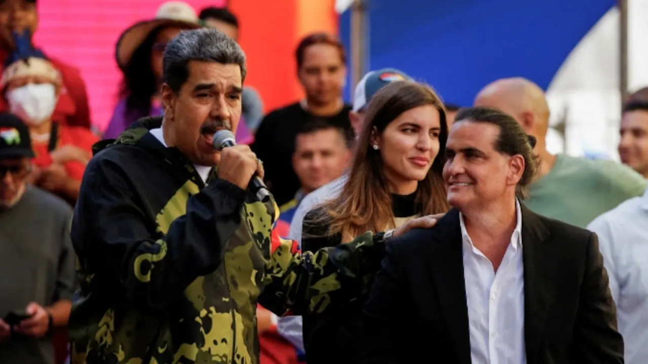 Venezuela's President Nicolas Maduro and Colombian businessman Alex Saab attend an event, in Caracas, Venezuela January 23, 2024. REUTERS/Leonardo Fernandez Viloria