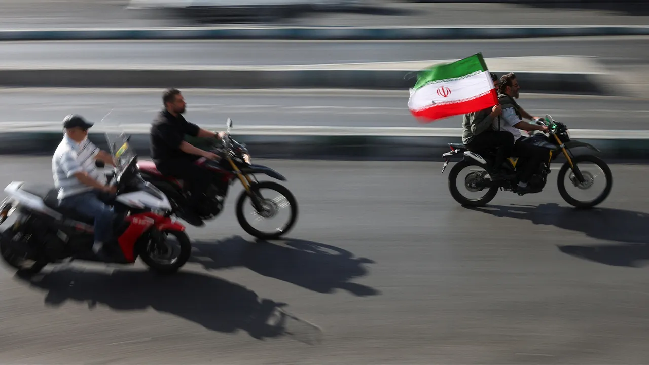 People ride on motorcycles as they participate in a march in Tehran, Iran, September 25, 2026. Majid Asgaripour/WANA (West Asia News Agency) via REUTERS ATTENTION EDITORS - THIS PICTURE WAS PROVIDED BY A THIRD PARTY. ISRAEL OUT. NO COMMERCIAL OR EDITORIAL SALES IN ISRAEL. NO ACCESS FOR ISRAELI MEDIA. NO USE BBC PERSIAN. NO USE VOA PERSIAN. NO USE MANOTO. NO USE IRAN INTERNATIONAL. NO USE RADIO FARDA. DIGITAL: NO USE BBC PERSIAN. NO USE VOA PERSIAN. NO USE MANOTO. NO USE IRAN INTERNATIONAL. NO USE RADIO FARD