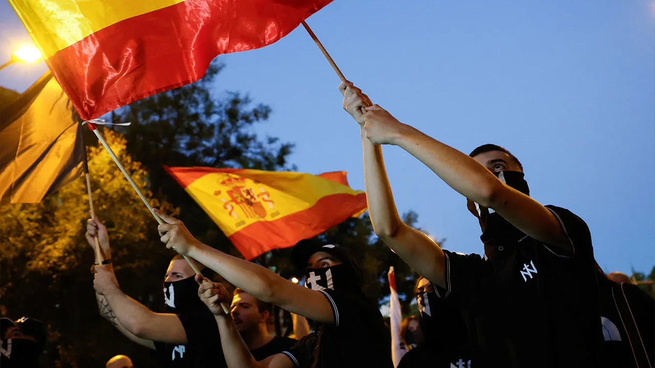 Protesters hold flags during a demonstration in support of residents of Spain's North African enclave of Ceuta following recent mass crossings of migrants from Morocco, in Madrid, Spain, September 2, 2026. REUTERS/Violeta Santos Moura