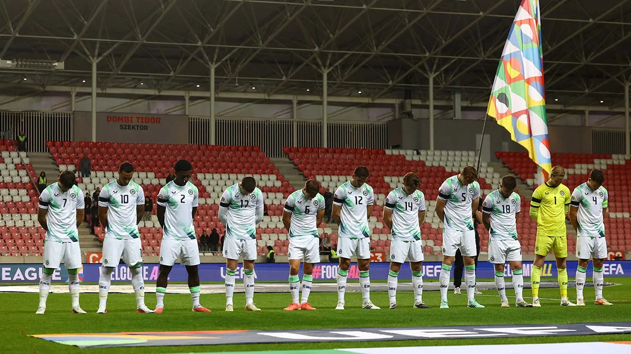 Soccer Football - Nations League - Group B3 - Israel v Republic of Ireland - Nagyerdei Stadion, Debrecen, Hungary - September 27, 2026 Republic of Ireland players wearing black armbands in recognition of all lives lost in the Gaza conflict bow their heads and during the Israel national anthem before the match REUTERS/Bernadett Szabo