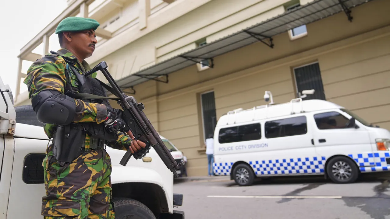 A police commando stands guard at the High Court complex ahead of a verdict related to the 2019 Easter bombings in Colombo, Sri Lanka, Tuesday, Sept. 22, 2026.(Eranga Jayawardane)
