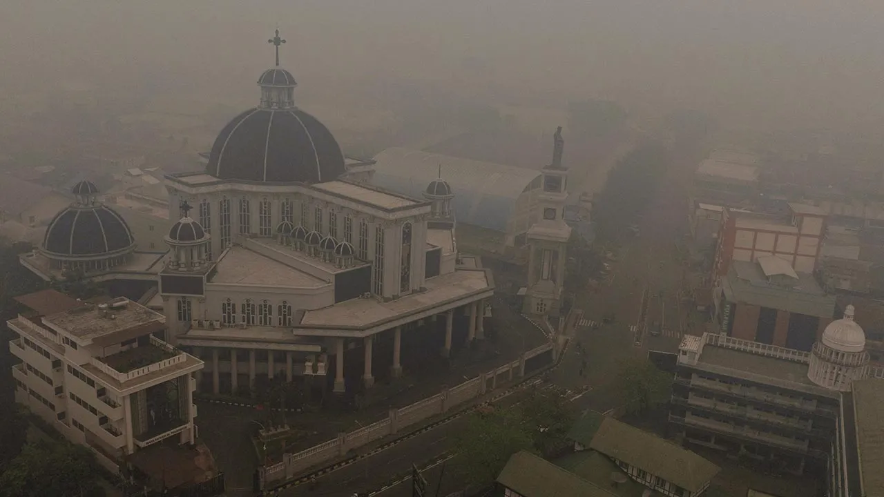 A drone view shows St. Joseph's Cathedral shrouded in haze from wildfires, in Pontianak, West Kalimantan province, Indonesia, September 15, 2026. REUTERS/Ajeng Dinar Ulfiana