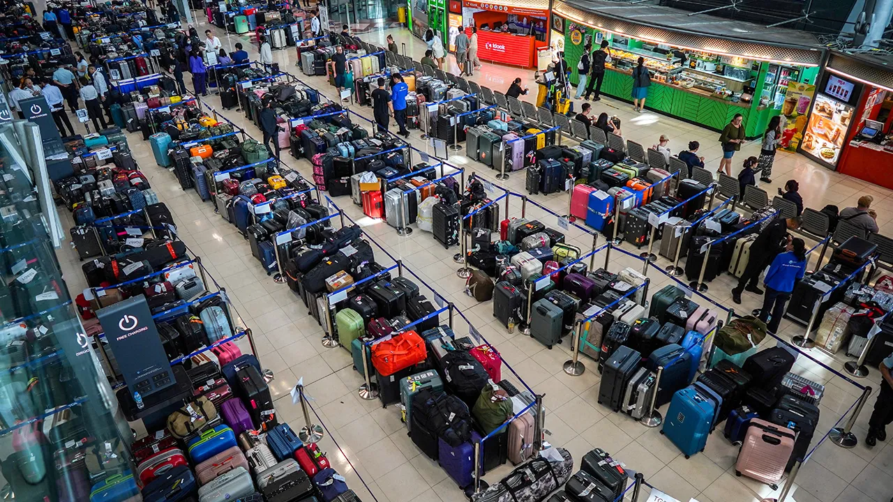 Baggage from Thai Airways flights at Suvarnabhumi International Airport after heavy rain and flooding disrupted the airline's ground operations, in Bangkok, Thailand, September 29, 2026. REUTERS/Athit Perawongmetha TPX IMAGES OF THE DAY