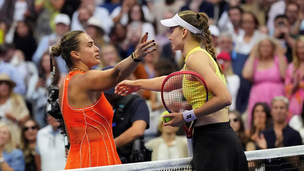 Tennis - U.S. Open - Flushing Meadows, New York, United States - September 12, 2026 Kazakhstan's Elena Rybakina embraces Belarus' Aryna Sabalenka at the net after winning the final match IMAGN IMAGES via Reuters/Robert Deutsch