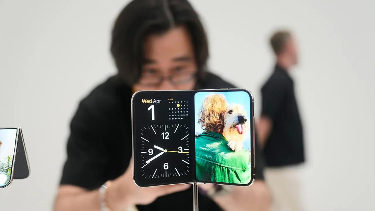 The iPhone Duo is displayed on Wednesday, Sept. 9, 2026, on the Apple campus in Cupertino, Calif. (AP Photo/Jeff Chiu)