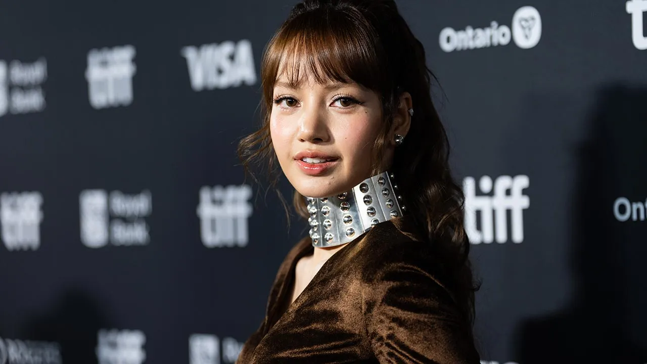 Lisa poses for a photograph on the red carpet for "Always Lalisa" at the Toronto International Film Festival in Toronto, Ontario, Friday, Sept. 11, 2026. (Arlyn McAdorey/The Canadian Press via AP)