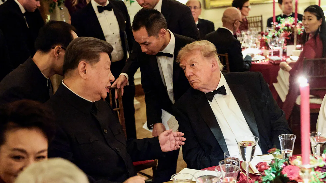 Chinese President Xi Jinping and US President Donald Trump speak during a state dinner at the White House in Washington, D.C., US, September 24, 2026. REUTERS/Evelyn Hockstein 