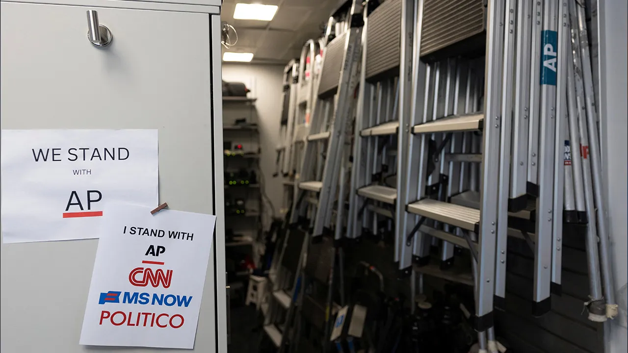 Signs hang in the media work area at the White House after CNN, MS NOW, and Politico were kicked off the White House grounds by US President Donald Trump, in Washington, DC, US, September 23, 2026. REUTERS/Evan
