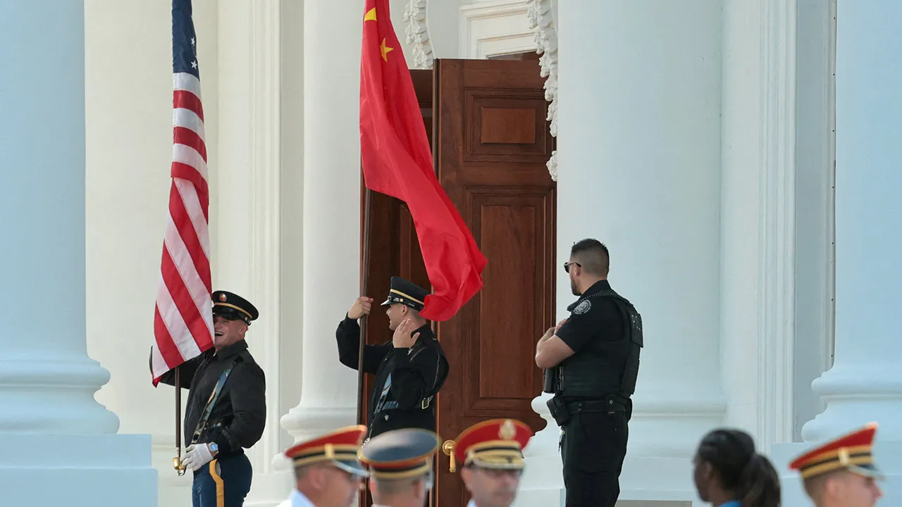 Members of a U.S. military honor guard rehearse an arrival ceremony with a Chinese flag and U.S. flag ahead of Chinese President Xi Jinping’s state visit next week with U.S. President Donald Trump at the White House in Washington, D.C., U.S., September 16, 2026. REUTERS/Jonathan Ernst