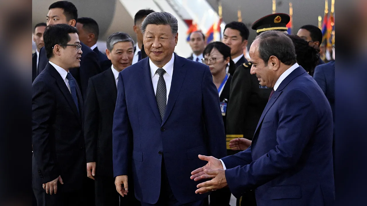 Egypt's President Abdel Fattah al-Sisi welcomes his Chinese counterpart Xi Jinping upon his arrival at the Cairo International Airport, Egypt, September 1, 2026. Khaled Desouki/Pool via REUTERS