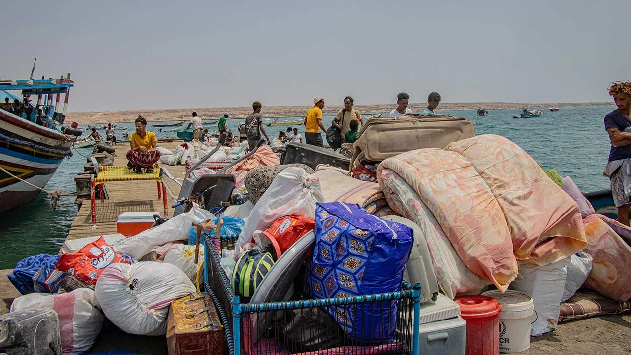 People fleeing from clashes between Houthi fighters and Saudi-backed Yemeni government forces, dock with their belongings at the shores of Obock on the Northern shore of the Gulf of Tadjoura, opening out into the Gulf of Aden in Djibouti, September 14, 2026. International Organization for Migration/Handout via REUTERS ATTENTION EDITORS - THIS IMAGE HAS BEEN SUPPLIED BY A THIRD PARTY. NO RESALES. NO ARCHIVES