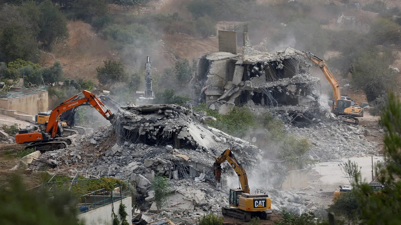Israeli military heavy machinery demolish two Palestinian buildings near Ramallah, in the Israeli-occupied West Bank, August 31, 2026. REUTERS/Mohammed Torokman TPX IMAGES OF THE DAY
