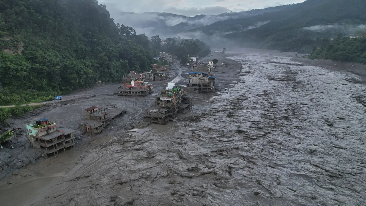 A drone view of the aftermath of flash flooding along the Trishuli river amidst fresh water surge warning in the Trishuli Bazaar area of Nuwakot district, Nepal, Sunday, Aug. 30, 2026. (AP Photo/Rajesh Kumar Singh)